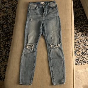 Distressed light wash skinny jeans
